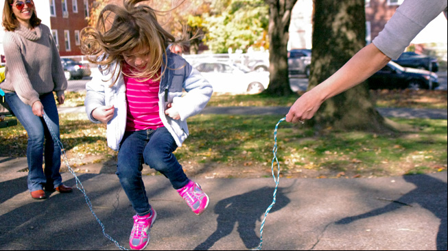 Girl jumps
rope